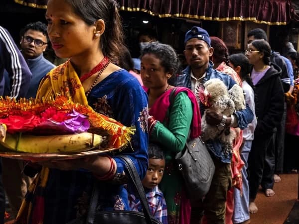 People Waiting For Puja